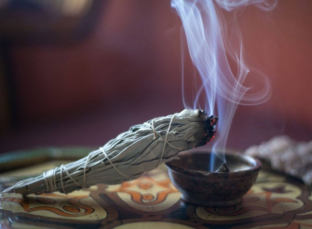 Burn sage and other herbs