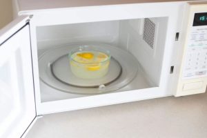 How long do you put a lemon in the microwave to clean it?