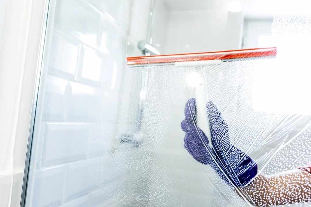 How to clean a glass shower door and keep it sparkling