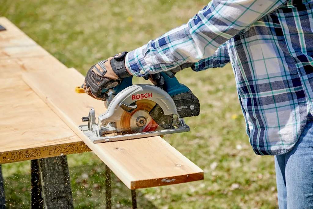 Step-by-step illustration of adjusting depth on a compact circular saw for safe, accurate plywood trimming.